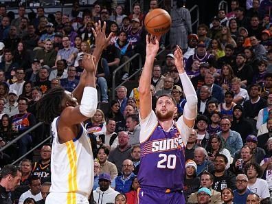 PHOENIX, AZ - DECEMBER 12: Jusuf Nurkic #20 of the Phoenix Suns shoots the ball during the game against the Golden State Warriors on December 12, 2023 at Footprint Center in Phoenix, Arizona. NOTE TO USER: User expressly acknowledges and agrees that, by downloading and or using this photograph, user is consenting to the terms and conditions of the Getty Images License Agreement. Mandatory Copyright Notice: Copyright 2023 NBAE (Photo by Garrett Ellwood/NBAE via Getty Images)