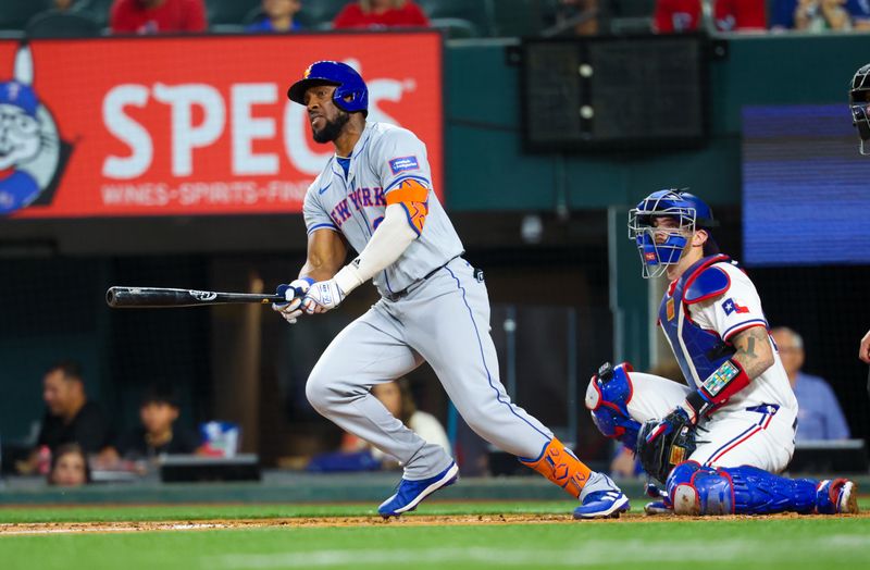 Jun 19, 2024; Arlington, Texas, USA; New York Mets right fielder Starling Marte (6) hits an rbi double during the fourth inning against the Texas Rangers at Globe Life Field. Mandatory Credit: Kevin Jairaj-USA TODAY Sports