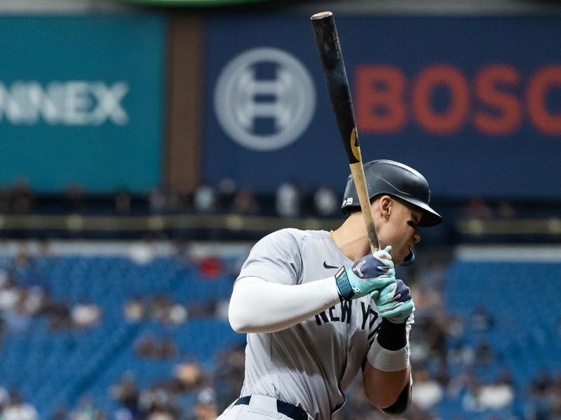 May 11, 2024; St. Petersburg, Florida, USA; New York Yankees outfielder Aaron Judge (99) is hit by a pitch against the Tampa Bay Rays during the first inning at Tropicana Field. Mandatory Credit: Matt Pendleton-USA TODAY Sports