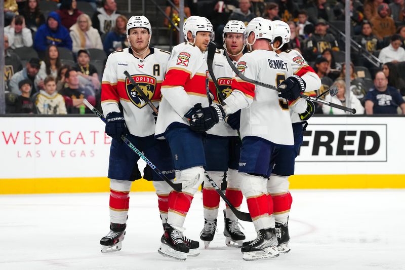 Jan 4, 2024; Las Vegas, Nevada, USA; Florida Panthers center Sam Reinhart (13) celebrates with team mates after scoring a third period goal against the Vegas Golden Knights at T-Mobile Arena. Mandatory Credit: Stephen R. Sylvanie-USA TODAY Sports