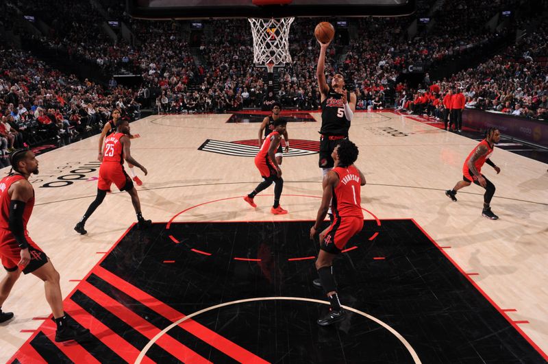 PORTLAND, OR - APRIL 12: Dalano Banton #5 of the Portland Trail Blazers shoots the ball during the game against the Houston Rockets on April 12, 2024 at the Moda Center Arena in Portland, Oregon. NOTE TO USER: User expressly acknowledges and agrees that, by downloading and or using this photograph, user is consenting to the terms and conditions of the Getty Images License Agreement. Mandatory Copyright Notice: Copyright 2024 NBAE (Photo by Cameron Browne/NBAE via Getty Images)