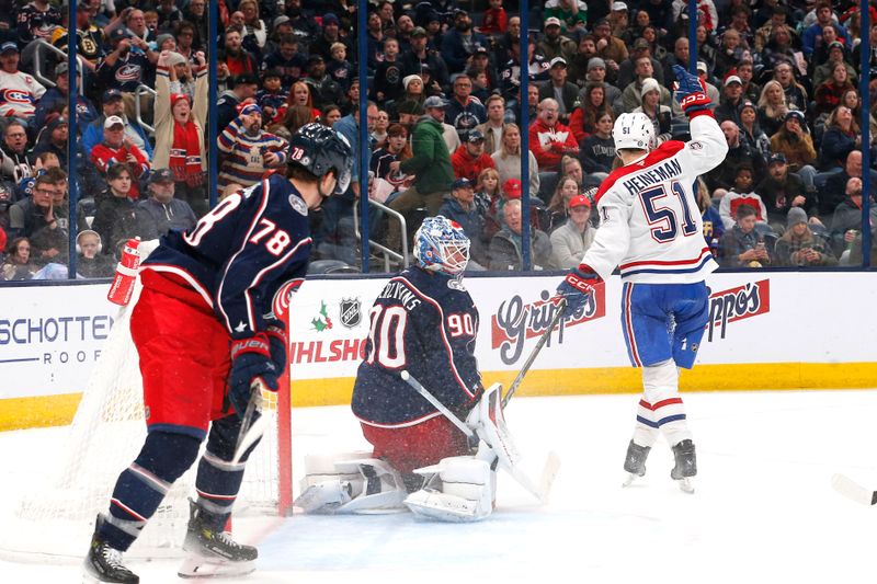 Nov 27, 2024; Columbus, Ohio, USA; Montreal Canadiens left wing Emil Heineman (51) celebrates his goal against the Columbus Blue Jackets during the third period at Nationwide Arena. Mandatory Credit: Russell LaBounty-Imagn Images