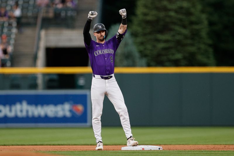 Jun 3, 2024; Denver, Colorado, USA; Colorado Rockies center fielder Brenton Doyle (9) reacts from second on a double in the first inning against the Cincinnati Reds at Coors Field. Mandatory Credit: Isaiah J. Downing-USA TODAY Sports