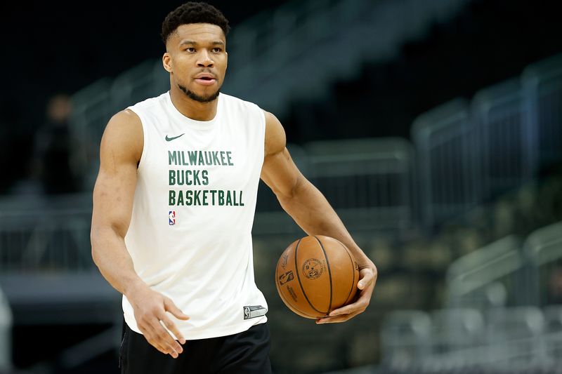 MILWAUKEE, WISCONSIN - APRIL 03: Giannis Antetokounmpo #34 of the Milwaukee Bucks works out before the game against the Memphis Grizzlies at Fiserv Forum on April 03, 2024 in Milwaukee, Wisconsin. NOTE TO USER: User expressly acknowledges and agrees that, by downloading and or using this photograph, User is consenting to the terms and conditions of the Getty Images License Agreement. (Photo by John Fisher/Getty Images)