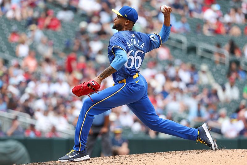 Jun 16, 2024; Minneapolis, Minnesota, USA; Minnesota Twins pitcher Jorge Alcala (66) delivers a pitch against the Oakland Athletics during the seventh inning of game one of a double header at Target Field. Mandatory Credit: Matt Krohn-USA TODAY Sports