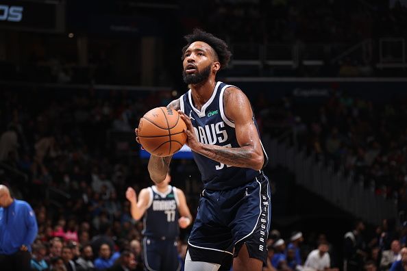 WASHINGTON, DC -? NOVEMBER 15: Derrick Jones Jr. #55 of the Dallas Mavericks prepares to shoot a free throw during the game against the Washington Wizards on November 15, 2023 at Capital One Arena in Washington, DC. NOTE TO USER: User expressly acknowledges and agrees that, by downloading and or using this Photograph, user is consenting to the terms and conditions of the Getty Images License Agreement. Mandatory Copyright Notice: Copyright 2023 NBAE (Photo by Stephen Gosling/NBAE via Getty Images)