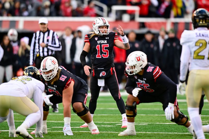 Nov 25, 2023; Salt Lake City, Utah, USA; Utah Utes quarterback Luke Bottari (15) calls a play against the Colorado Buffaloes at Rice-Eccles Stadium. Mandatory Credit: Christopher Creveling-USA TODAY Sports