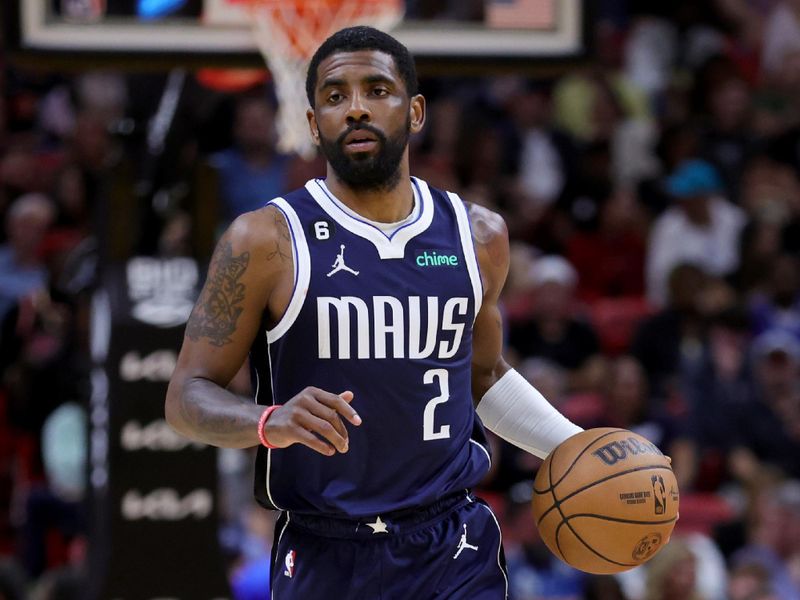 MIAMI, FLORIDA - APRIL 01: Kyrie Irving #2 of the Dallas Mavericks in action against the Miami Heat during the second quarter at Miami-Dade Arena on April 01, 2023 in Miami, Florida. NOTE TO USER: User expressly acknowledges and agrees that, by downloading and or using this photograph, User is consenting to the terms and conditions of the Getty Images License Agreement. (Photo by Megan Briggs/Getty Images)