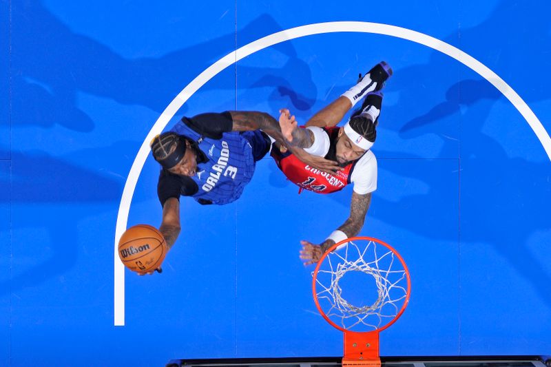 ORLANDO, FL - NOVEMBER 8: Kentavious Caldwell-Pope #3 of the Orlando Magic drives to the basket during the game against the New Orleans Pelicans on November 8, 2024 at the Kia Center in Orlando, Florida. NOTE TO USER: User expressly acknowledges and agrees that, by downloading and or using this photograph, User is consenting to the terms and conditions of the Getty Images License Agreement. Mandatory Copyright Notice: Copyright 2024 NBAE (Photo by Fernando Medina/NBAE via Getty Images)