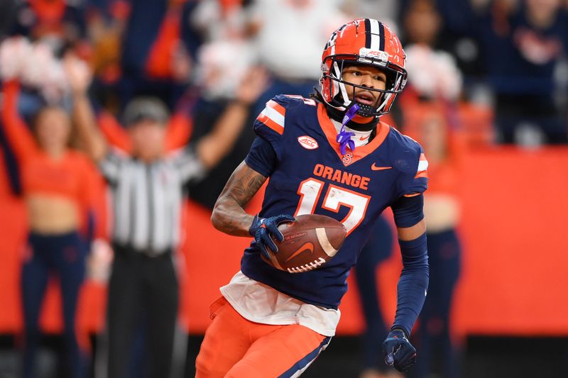 Nov 25, 2023; Syracuse, New York, USA; Syracuse Orange wide receiver Umari Hatcher (17) runs into the end zone for a touchdown against the Wake Forest Demon Deacons during the second half at the JMA Wireless Dome. Mandatory Credit: Rich Barnes-USA TODAY Sports