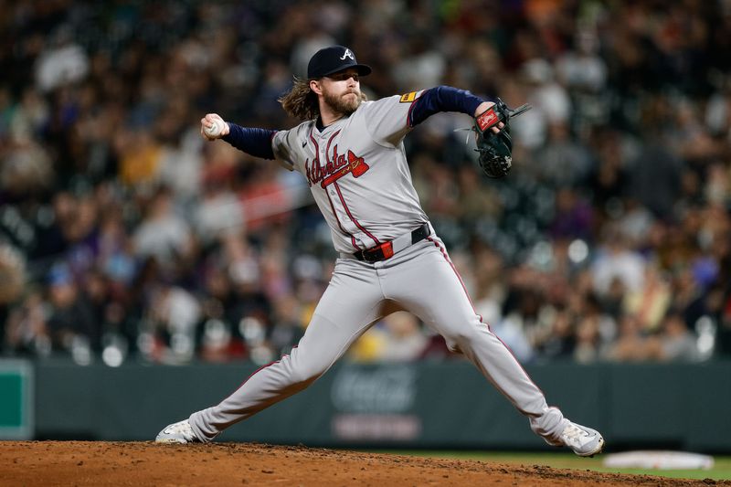 Aug 9, 2024; Denver, Colorado, USA; Atlanta Braves relief pitcher Pierce Johnson (38) pitches in the eighth inning against the Colorado Rockies at Coors Field. Mandatory Credit: Isaiah J. Downing-USA TODAY Sports