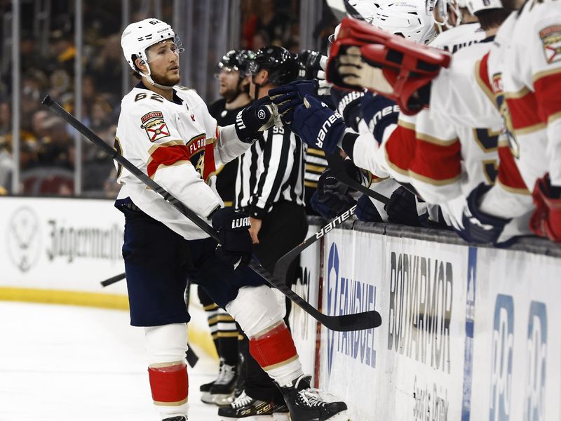 May 10, 2024; Boston, Massachusetts, USA; Florida Panthers defenseman Brandon Montour (62) is congratulated at the bench after scoring against the Boston Bruins during the third period of game three of the second round of the 2024 Stanley Cup Playoffs at TD Garden. Mandatory Credit: Winslow Townson-USA TODAY Sports