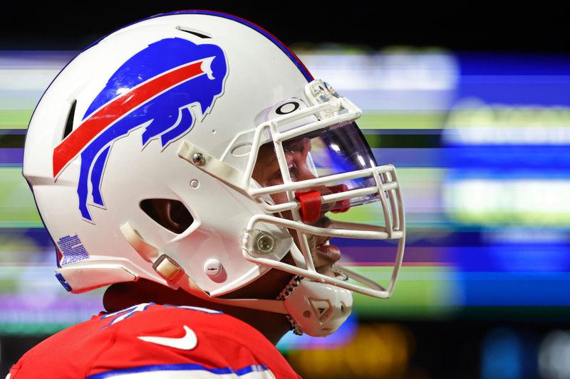 Buffalo Bills offensive tackle Dion Dawkins (73) looks on during the first half of an NFL football game against the New York Giants in Orchard Park, N.Y., Sunday Oct. 15, 2023. (AP Photo/ Jeffrey T. Barnes)