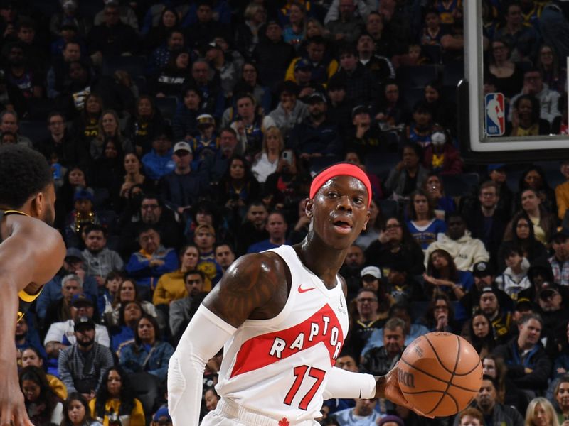 SAN FRANCISCO, CA - JANUARY 7: Dennis Schroder #17 of the Toronto Raptors dribbles the ball during the game against the Golden State Warriors on January 7, 2024 at Chase Center in San Francisco, California. NOTE TO USER: User expressly acknowledges and agrees that, by downloading and or using this photograph, user is consenting to the terms and conditions of Getty Images License Agreement. Mandatory Copyright Notice: Copyright 2024 NBAE (Photo by Noah Graham/NBAE via Getty Images)