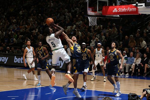 MINNEAPOLIS, MN -  DECEMBER 16: Anthony Edwards #5 of the Minnesota Timberwolves shoots the ball during the game against the Indiana Pacers on December 16 , 2023 at Target Center in Minneapolis, Minnesota. NOTE TO USER: User expressly acknowledges and agrees that, by downloading and or using this Photograph, user is consenting to the terms and conditions of the Getty Images License Agreement. Mandatory Copyright Notice: Copyright 2023 NBAE (Photo by David Sherman/NBAE via Getty Images)