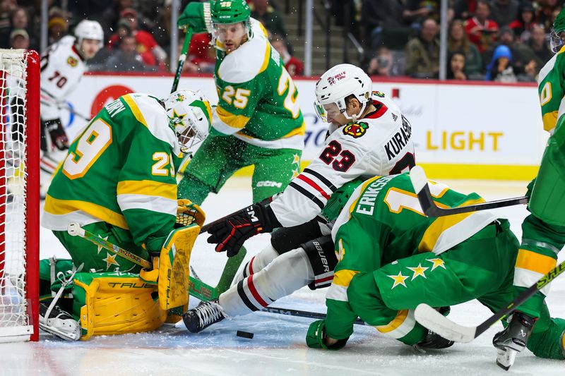 Dec 3, 2023; Saint Paul, Minnesota, USA; Minnesota Wild goaltender Marc-Andre Fleury (29) makes a save on a shot by Chicago Blackhawks center Philipp Kurashev (23) during the third period at Xcel Energy Center. Mandatory Credit: Matt Krohn-USA TODAY Sports