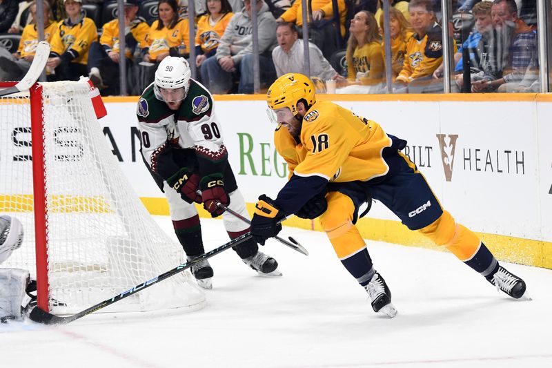 Nov 11, 2023; Nashville, Tennessee, USA; Nashville Predators center Liam Foudy (18) has a wrap around attempt stopped during the first period against the Arizona Coyotes at Bridgestone Arena. Mandatory Credit: Christopher Hanewinckel-USA TODAY Sports