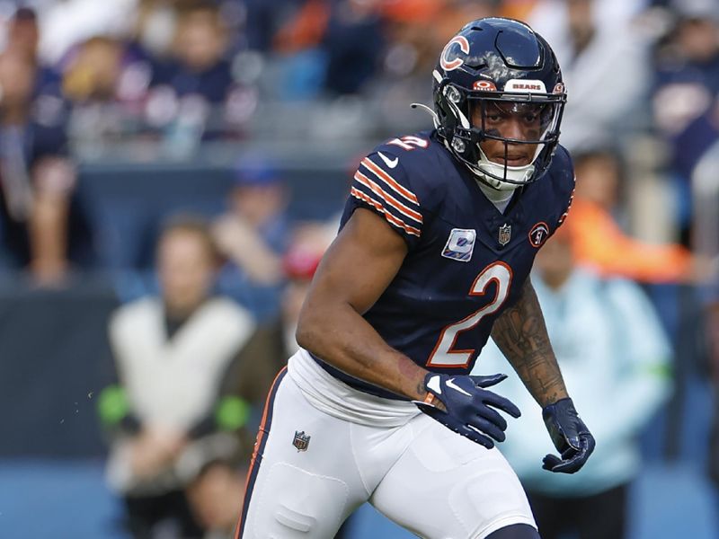 Chicago Bears wide receiver DJ Moore (2) runs on the field during the second half of an NFL football game against the Minnesota Vikings, Sunday, Oct. 15, 2023, in Chicago. (AP Photo/Kamil Krzaczynski)