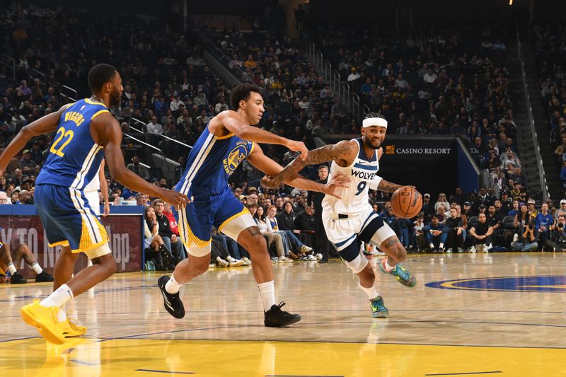 SAN FRANCISCO, CA - DECEMBER 6: Nickeil Alexander-Walker #9 of the Minnesota Timberwolves drives to the basket during the game against the Golden State Warriors on December 6, 2024 at Chase Center in San Francisco, California. NOTE TO USER: User expressly acknowledges and agrees that, by downloading and or using this photograph, user is consenting to the terms and conditions of Getty Images License Agreement. Mandatory Copyright Notice: Copyright 2024 NBAE (Photo by Noah Graham/NBAE via Getty Images)