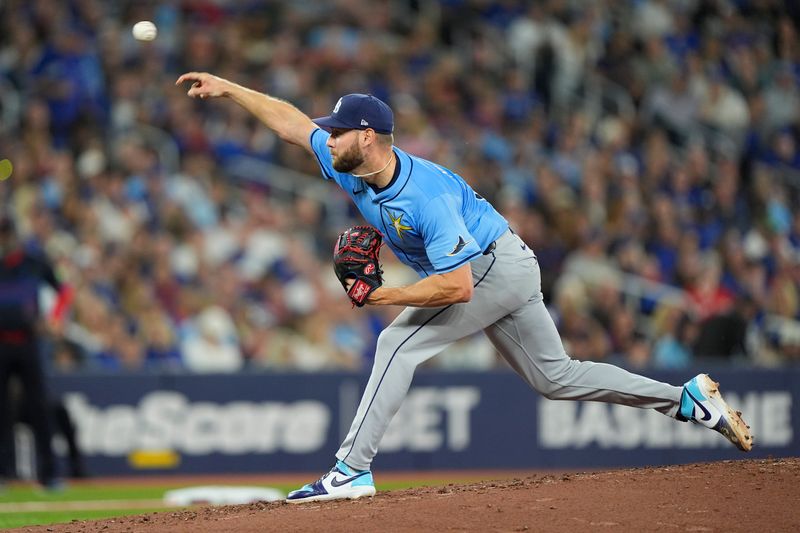 Sep 26, 2025; Toronto, Ontario, CAN; Tampa Bay Rays starting pitcher Adrian Houser (37) pitches to the Toronto Blue Jays during the second inning at Rogers Centre. Mandatory Credit: John E. Sokolowski-Imagn Images