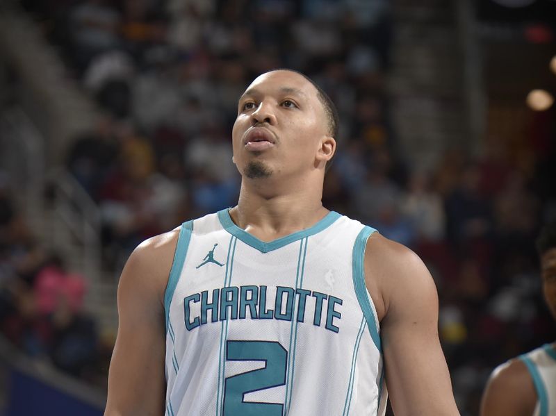 CLEVELAND, OH - NOVEMBER 17: Grant Williams #2 of the Charlotte Hornets shoots a free throw during the game against the Cleveland Cavaliers on November 17, 2024 at Rocket Mortgage FieldHouse in Cleveland, Ohio. NOTE TO USER: User expressly acknowledges and agrees that, by downloading and/or using this Photograph, user is consenting to the terms and conditions of the Getty Images License Agreement. Mandatory Copyright Notice: Copyright 2024 NBAE (Photo by David Liam Kyle/NBAE via Getty Images)