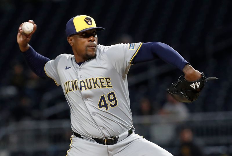 Apr 22, 2024; Pittsburgh, Pennsylvania, USA;  Milwaukee Brewers relief pitcher Thyago Vieira (49) pitches against the Pittsburgh Pirates during the seventh inning at PNC Park. Pittsburgh won 4-2. Mandatory Credit: Charles LeClaire-USA TODAY Sports