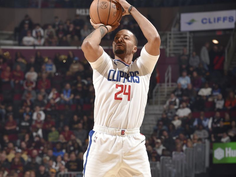 CLEVELAND, OH - JANUARY 29: Norman Powell #24 of the LA Clippers shoots the ball during the game against the Cleveland Cavaliers on January 29, 2024 at Rocket Mortgage FieldHouse in Cleveland, Ohio. NOTE TO USER: User expressly acknowledges and agrees that, by downloading and/or using this Photograph, user is consenting to the terms and conditions of the Getty Images License Agreement. Mandatory Copyright Notice: Copyright 2024 NBAE (Photo by David Liam Kyle/NBAE via Getty Images)