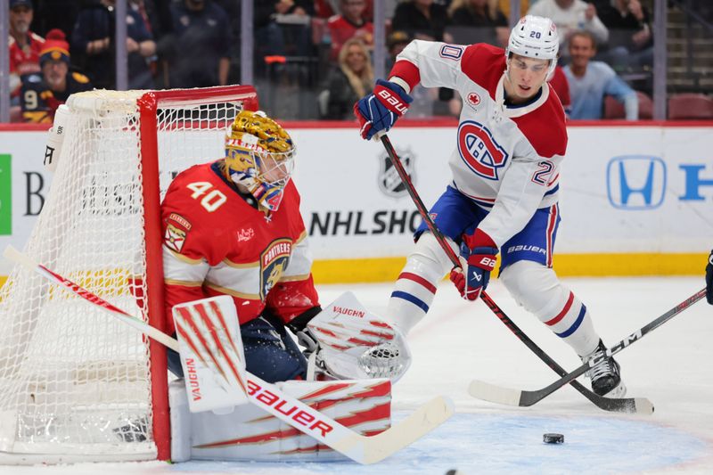 Dec 30, 2025; Sunrise, Florida, USA; Montreal Canadiens left wing Juraj Slafkovsky (20) misses a shot against Florida Panthers goaltender Daniil Tarasov (40) during the second period at Amerant Bank Arena. Mandatory Credit: Sam Navarro-Imagn Images