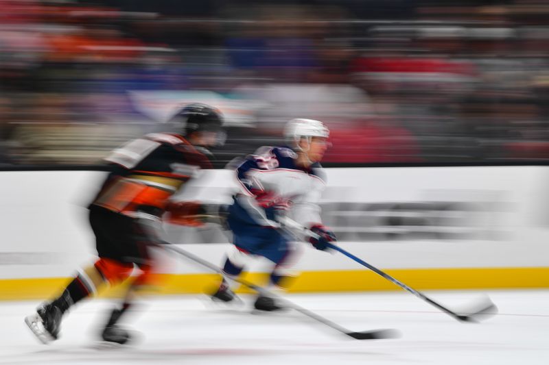 Feb 21, 2024; Anaheim, California, USA; Columbus Blue Jackets right wing Yegor Chinakhov (59) moves the puck against the Anaheim Ducks  mduring the second period at Honda Center. Mandatory Credit: Gary A. Vasquez-USA TODAY Sports