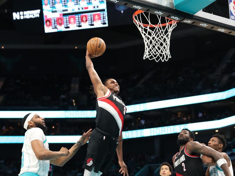 CHARLOTTE, NC - APRIL 3:  Jabari Walker #34 of the Portland Trail Blazers drives to the basket during the game against the Charlotte Hornets on April 3, 2024 at Spectrum Center in Charlotte, North Carolina. NOTE TO USER: User expressly acknowledges and agrees that, by downloading and or using this photograph, User is consenting to the terms and conditions of the Getty Images License Agreement.  Mandatory Copyright Notice:  Copyright 2024 NBAE (Photo by Brock Williams-Smith/NBAE via Getty Images)