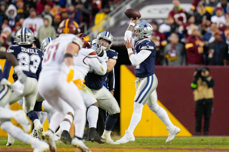 Dallas Cowboys quarterback Dak Prescott (4) passes against the Washington Commanders during the first half, Sunday, January 7, 2024, in Landover, Md. Dallas won 38-10. (AP Photo/Jess Rapfogel)