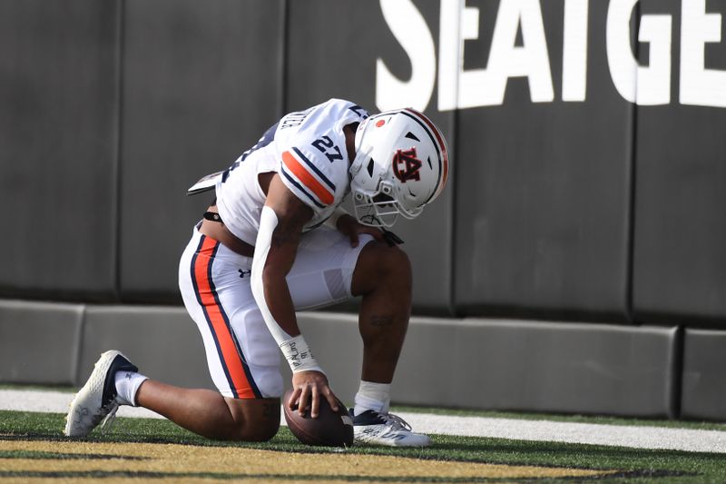 Nov 4, 2023; Nashville, Tennessee, USA; Auburn Tigers running back Jarquez Hunter (27) after a touchdown during the first half against the Vanderbilt Commodores at FirstBank Stadium. Mandatory Credit: Christopher Hanewinckel-USA TODAY Sports