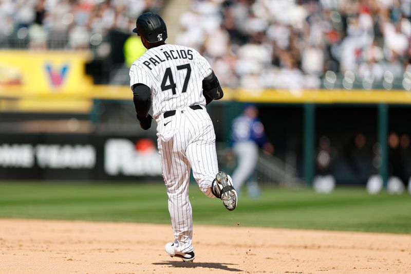 May 24, 2025; Chicago, Illinois, USA; Chicago White Sox left fielder Joshua Palacios (47) rounds the bases after hitting a two-run home run against the Texas Rangers during the fourth inning at Rate Field. Mandatory Credit: Kamil Krzaczynski-Imagn Images