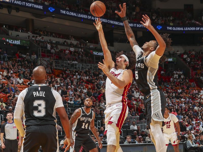 MIAMI, FL - OCTOBER 15: Jaime Jaquez Jr. #11 of the Miami Heat shoots the ball during the game on October 15, 2024 at Kaseya Center in Miami, Florida. NOTE TO USER: User expressly acknowledges and agrees that, by downloading and or using this Photograph, user is consenting to the terms and conditions of the Getty Images License Agreement. Mandatory Copyright Notice: Copyright 2024 NBAE (Photo by Issac Baldizon/NBAE via Getty Images)