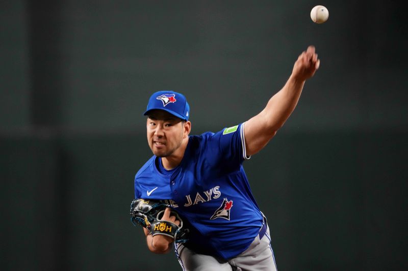 Jul 14, 2024; Phoenix, Arizona, USA; Toronto Blue Jays pitcher Yusei Kikuchi (16) pitches against the Arizona Diamondbacks during the first inning at Chase Field. Mandatory Credit: Joe Camporeale-USA TODAY Sports