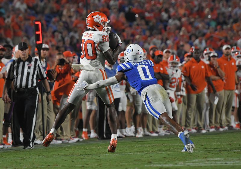 Sep 4, 2023; Durham, North Carolina, USA; Clemson Tigers wide receiver Beaux Collins (80) catches a pass near Duke Blue Devils cornerback Chandler Rivers (0) during the third quarter at Wallace Wade Stadium in Durham, N.C. Mandatory Credit: Ken Ruinard-USA TODAY Sports