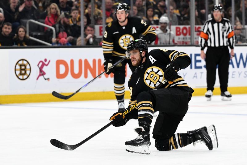 Feb 10, 2024; Boston, Massachusetts, USA; Boston Bruins right wing David Pastrnak (88) takes a shot against the Washington Capitals during the third period at the TD Garden. Mandatory Credit: Brian Fluharty-USA TODAY Sports