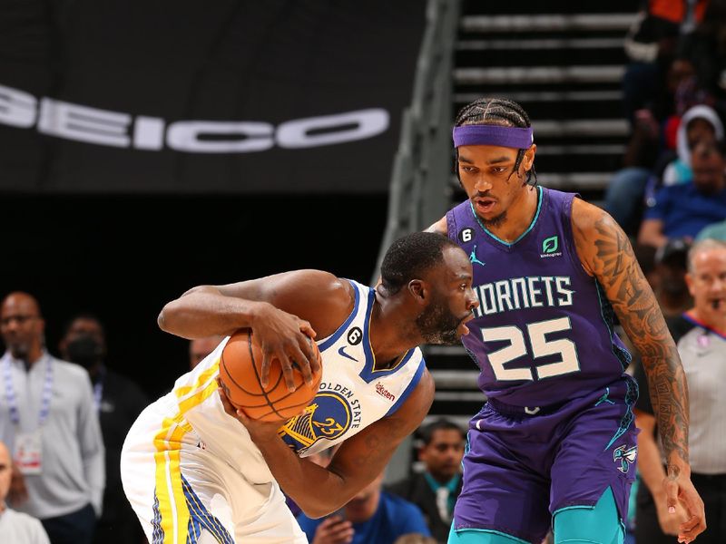 CHARLOTTE, NC -OCTOBER 29: Draymond Green #23 of the Golden State Warriors handles the ball during the game against the Charlotte Hornets on October 29, 2022 at Spectrum Center in Charlotte, North Carolina. NOTE TO USER: User expressly acknowledges and agrees that, by downloading and or using this photograph, User is consenting to the terms and conditions of the Getty Images License Agreement. Mandatory Copyright Notice: Copyright 2022 NBAE (Photo by Kent Smith/NBAE via Getty Images)