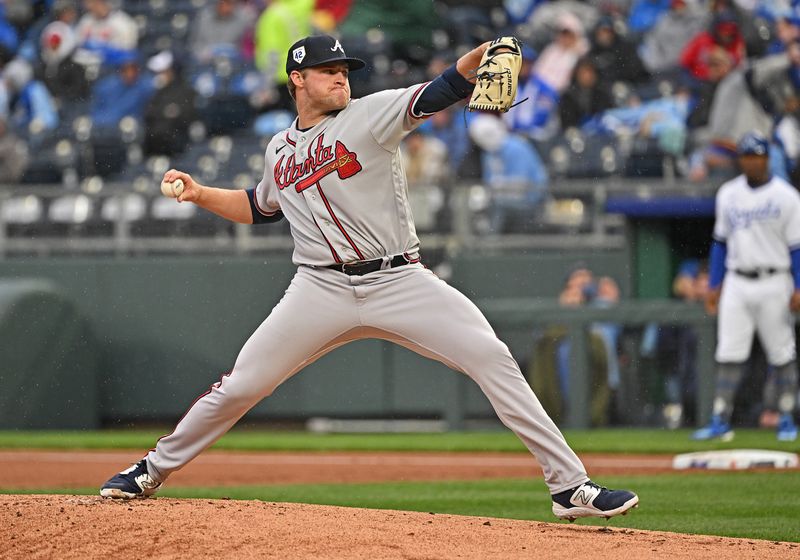 Apr 15, 2023; Kansas City, Missouri, USA;  Atlanta Braves starting pitcher Bryce Elder (55) delivers a pitch during the first inning against the Kansas City Royals at Kauffman Stadium. Mandatory Credit: Peter Aiken-USA TODAY Sports