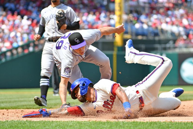 Apr 23, 2023; Philadelphia, Pennsylvania, USA; Philadelphia Phillies third baseman Edmundo Sosa (33) is tagged out by Colorado Rockies relief pitcher Brent Suter (39) after being picked off and caught in a rundown during the fifth inning at Citizens Bank Park. Mandatory Credit: Eric Hartline-USA TODAY Sports