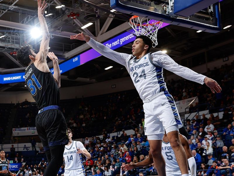 Mar 4, 2023; Colorado Springs, Colorado, USA; San Jose State Spartans forward Tibet Gorener (31) attempts a shot as Air Force Falcons guard Jeffrey Mills (24) defends in the first half at Clune Arena. Mandatory Credit: Isaiah J. Downing-USA TODAY Sports