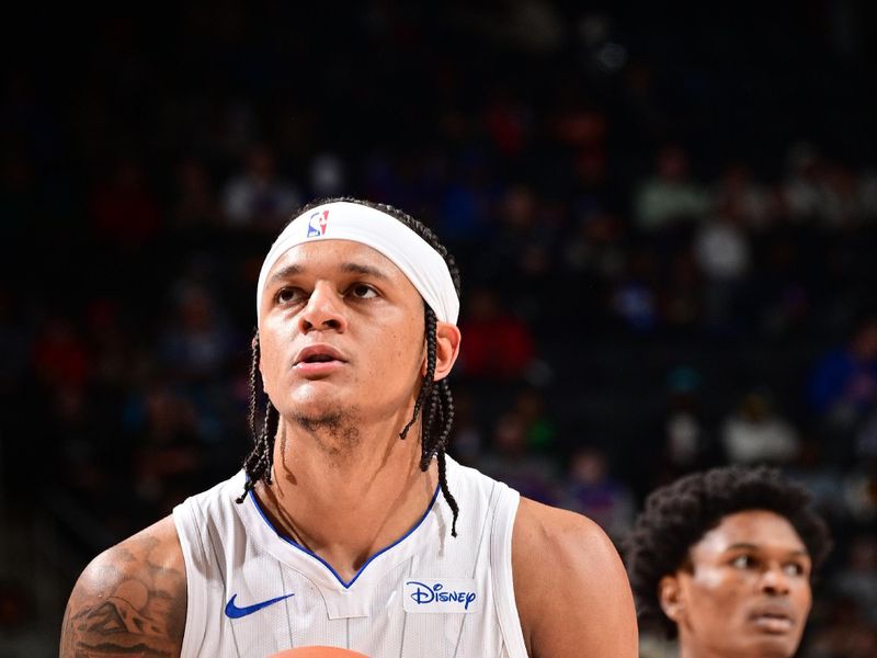 DETROIT, MI - FEBRUARY 4: Paolo Banchero #5 of the Orlando Magic shoots a free throw during the game against the Detroit Pistons on February 4, 2024 at Little Caesars Arena in Detroit, Michigan. NOTE TO USER: User expressly acknowledges and agrees that, by downloading and/or using this photograph, User is consenting to the terms and conditions of the Getty Images License Agreement. Mandatory Copyright Notice: Copyright 2024 NBAE (Photo by Chris Schwegler/NBAE via Getty Images)