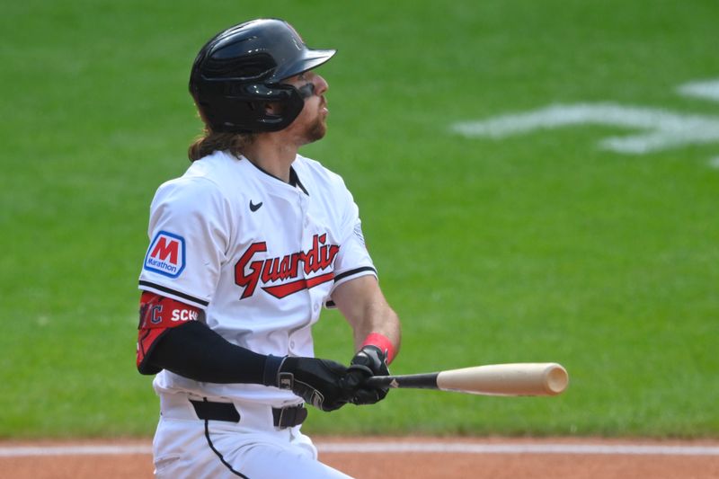 Jun 22, 2024; Cleveland, Ohio, USA; Cleveland Guardians center fielder Daniel Schneemann (10) watches his solo home run in the sixth inning against the Toronto Blue Jays at Progressive Field. Mandatory Credit: David Richard-USA TODAY Sports