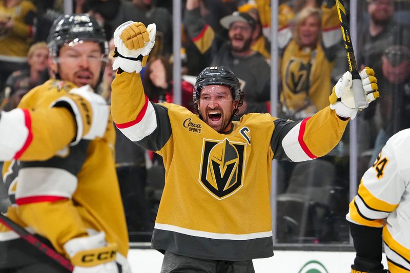 Oct 16, 2025; Las Vegas, Nevada, USA; Vegas Golden Knights right wing Mark Stone (61) celebrates after center Tomas Hertl (48) scored a goal against the Boston Bruins during the second period at T-Mobile Arena. Mandatory Credit: Stephen R. Sylvanie-Imagn Images