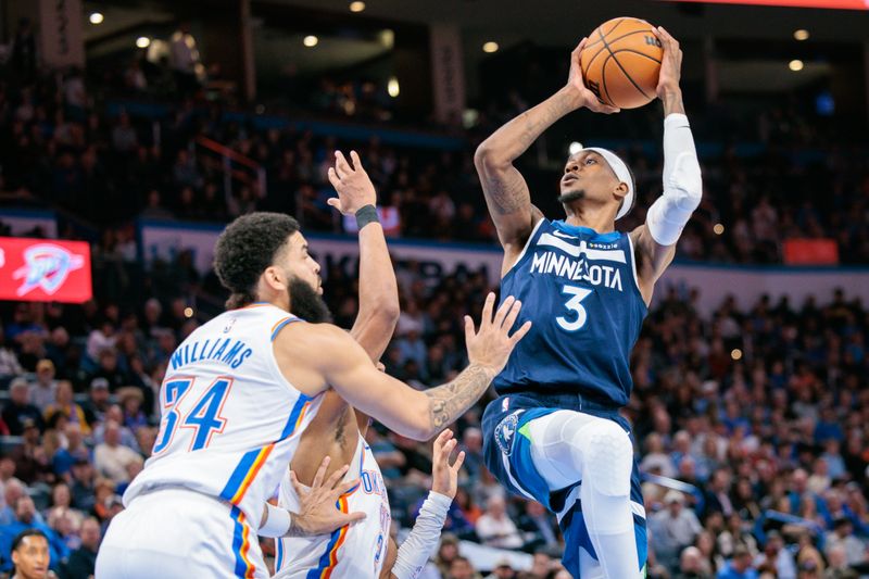 OKLAHOMA CITY, OKLAHOMA - FEBRUARY 24: Jaden McDaniels #3 of the Minnesota Timberwolves shoots the ball during the fourth quarter against the Oklahoma City Thunder at Paycom Center on February 24, 2025 in Oklahoma City, Oklahoma. NOTE TO USER: User expressly acknowledges and agrees that, by downloading and or using this photograph, User is consenting to the terms and conditions of the Getty Images License Agreement. (Photo by William Purnell/Getty Images)