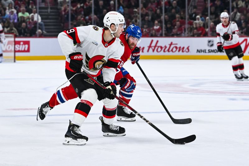 Oct 12, 2024; Montreal, Quebec, CAN; Ottawa Senators center Josh Norris (9) plays the puck against Montreal Canadiens defenseman David Savard (58) during the second period at Bell Centre. Mandatory Credit: David Kirouac-Imagn Images