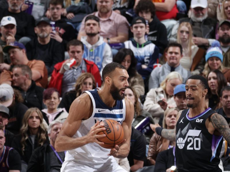 SALT LAKE CITY, UT - JANUARY 30:  Rudy Gobert #27 of the Minnesota Timberwolves handles the ball during the game against the Utah Jazz on January 30, 2025 at Delta Center in Salt Lake City, Utah. NOTE TO USER: User expressly acknowledges and agrees that, by downloading and or using this Photograph, User is consenting to the terms and conditions of the Getty Images License Agreement. Mandatory Copyright Notice: Copyright 2025 NBAE (Photo by Melissa Majchrzak/NBAE via Getty Images)