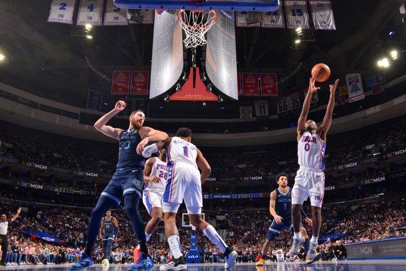 PHILADELPHIA, PA - NOVEMBER 2: Tyrese Maxey #0 of the Philadelphia 76ers rebounds the ball during the game against the Memphis Grizzlies on November 2, 2024 at the Wells Fargo Center in Philadelphia, Pennsylvania NOTE TO USER: User expressly acknowledges and agrees that, by downloading and/or using this Photograph, user is consenting to the terms and conditions of the Getty Images License Agreement. Mandatory Copyright Notice: Copyright 2024 NBAE (Photo by Jesse D. Garrabrant/NBAE via Getty Images)