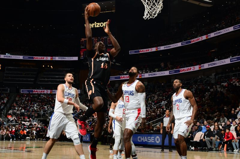 ATLANTA, GA - JANUARY 28: Clint Capela #15 of the Atlanta Hawks drives to the basket during the game against the LA Clippers on January 28, 2023 at State Farm Arena in Atlanta, Georgia.  NOTE TO USER: User expressly acknowledges and agrees that, by downloading and/or using this Photograph, user is consenting to the terms and conditions of the Getty Images License Agreement. Mandatory Copyright Notice: Copyright 2023 NBAE (Photo by Scott Cunningham/NBAE via Getty Images)