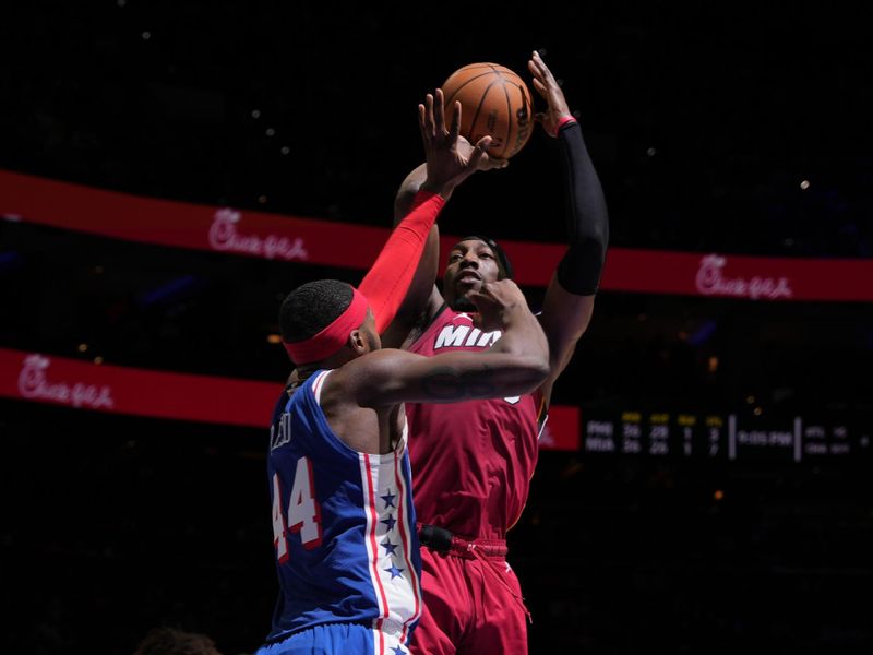 PHILADELPHIA, PA - FEBRUARY 14: Bam Adebayo #13 of the Miami Heat shoots the ball during the game against the Philadelphia 76ers on February 14, 2024 at the Wells Fargo Center in Philadelphia, Pennsylvania NOTE TO USER: User expressly acknowledges and agrees that, by downloading and/or using this Photograph, user is consenting to the terms and conditions of the Getty Images License Agreement. Mandatory Copyright Notice: Copyright 2024 NBAE (Photo by Jesse D. Garrabrant/NBAE via Getty Images)